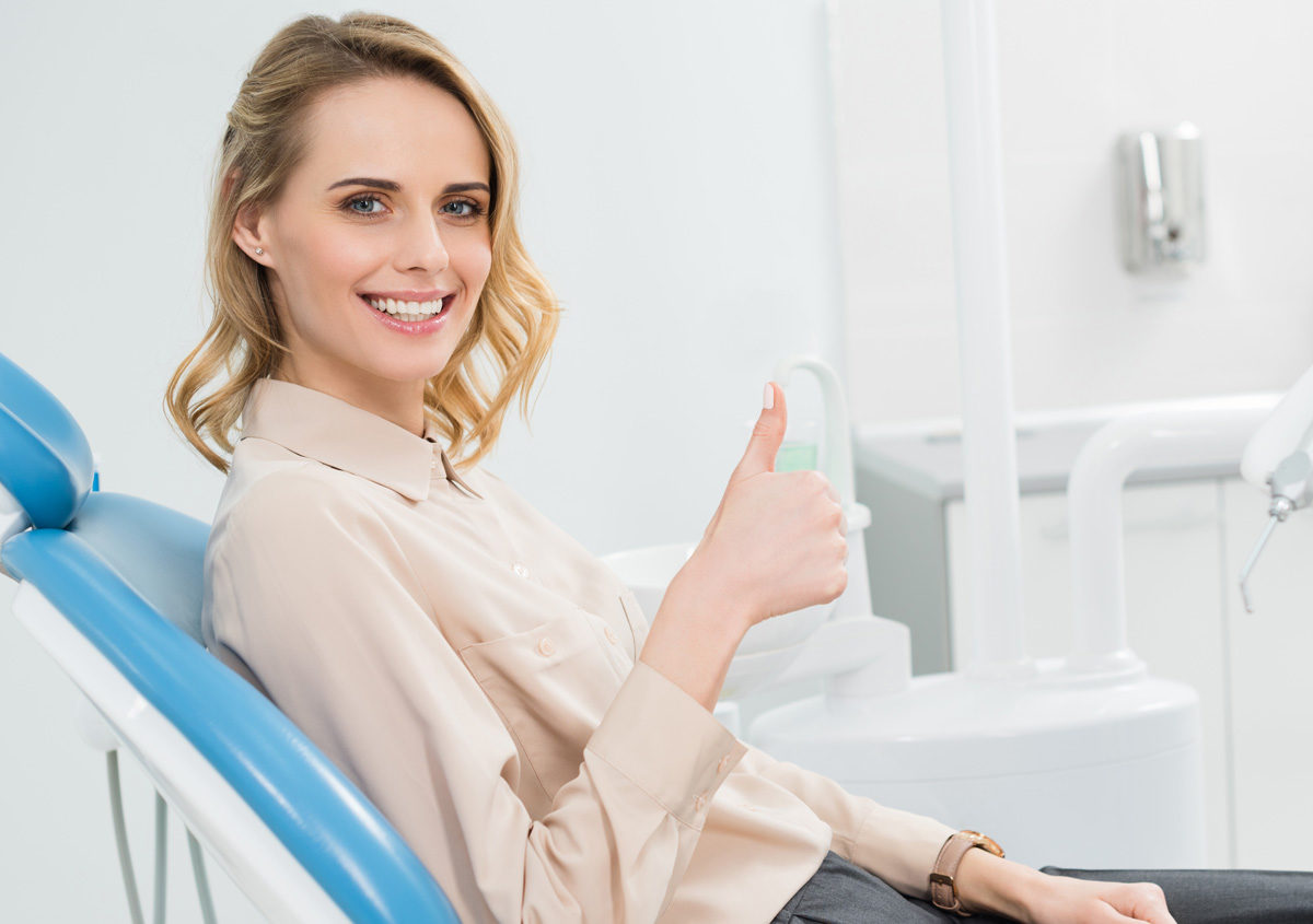 What are some services provided by a cosmetic dentist in Sacramento?