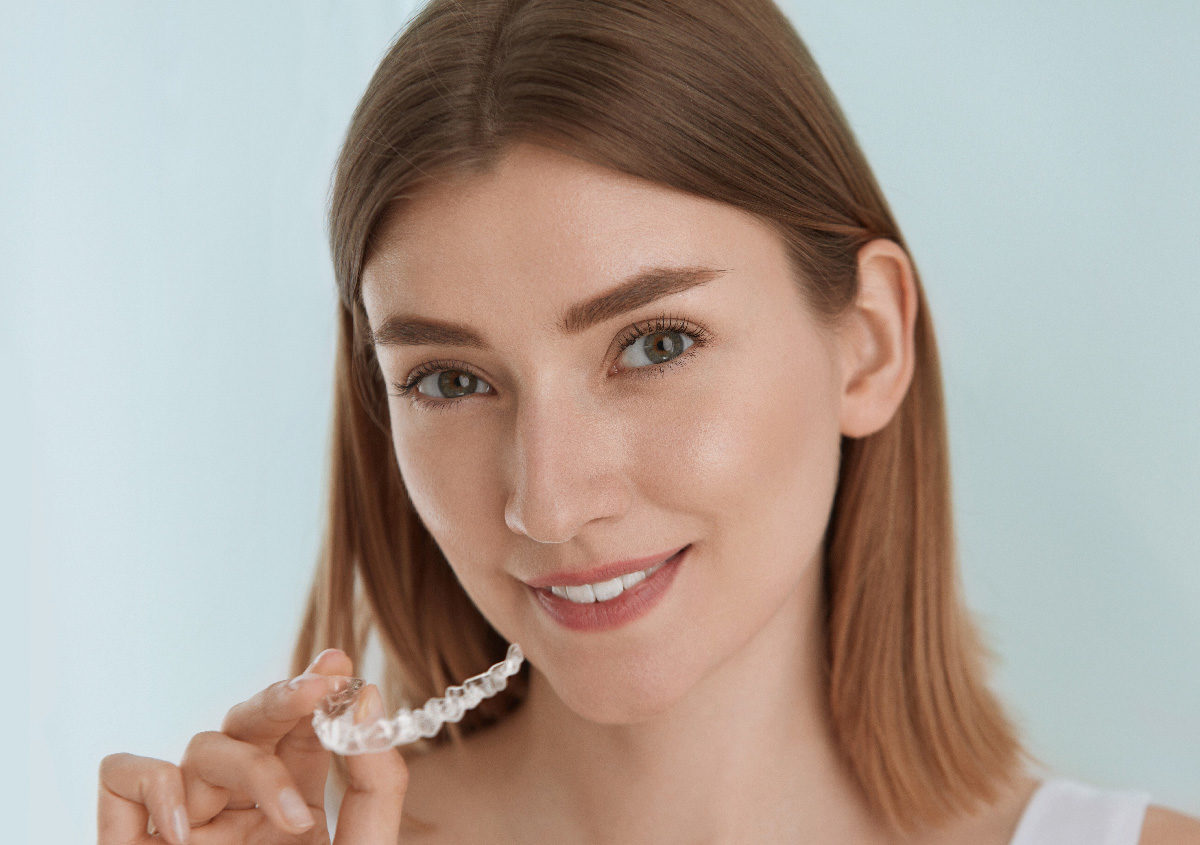 Uncomfortable with Metal Braces? Quality Invisalign Treatment for Adults Can Straighten Your Smile